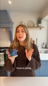 A customer reviewing the Ocean Pott in her kitchen
